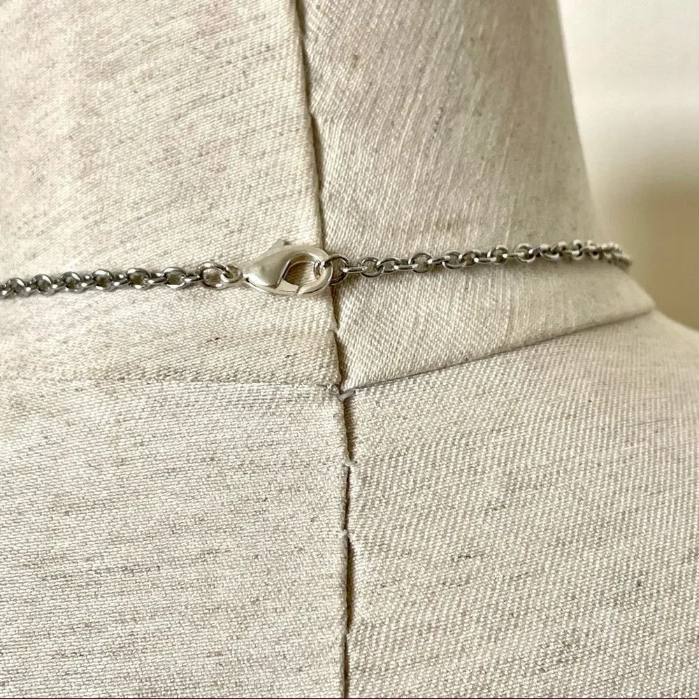 Silver tone disc necklace